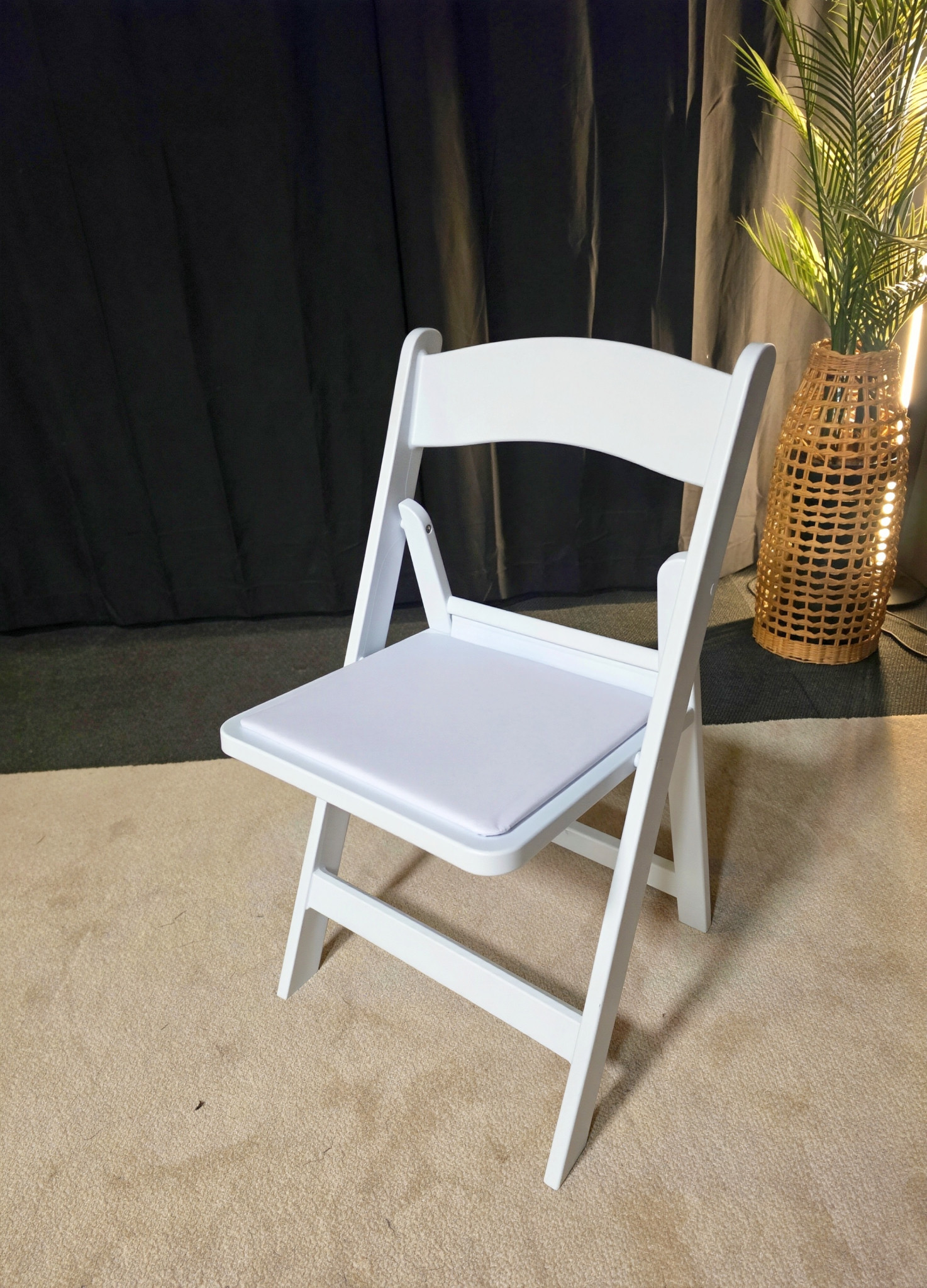 White resin padded chair